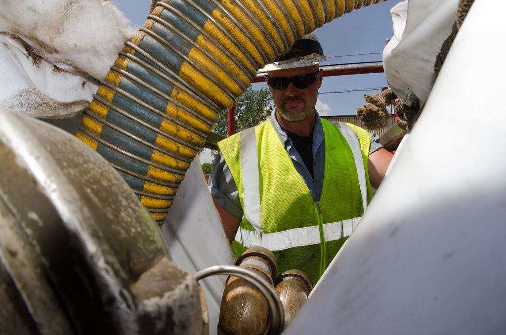 A former industrial site under environmental assessment, showing buildings and yard conditions inspectors evaluate.